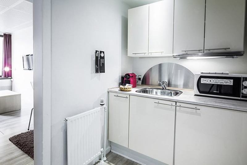 玛农勒斯套房古斯米登酒店 哥本哈根 外观 照片 A typical studio apartment kitchen