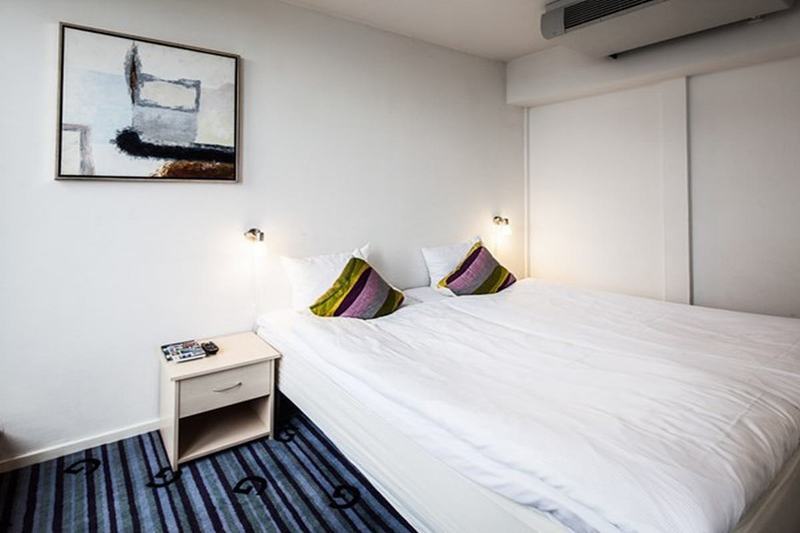 玛农勒斯套房古斯米登酒店 哥本哈根 外观 照片 A bedroom at the hotel